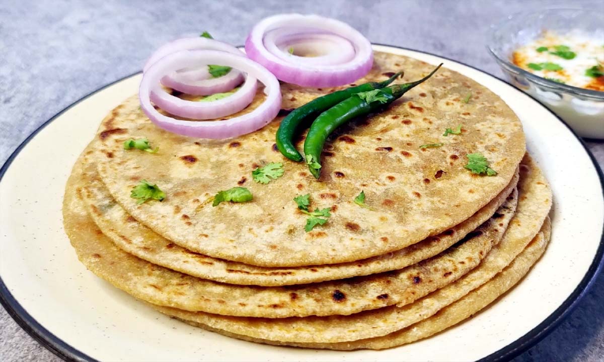 Onion Paratha : घर आये मेहमानो के लिए बनाये प्याज के परांठे , यहाँ जाने रेसिपी