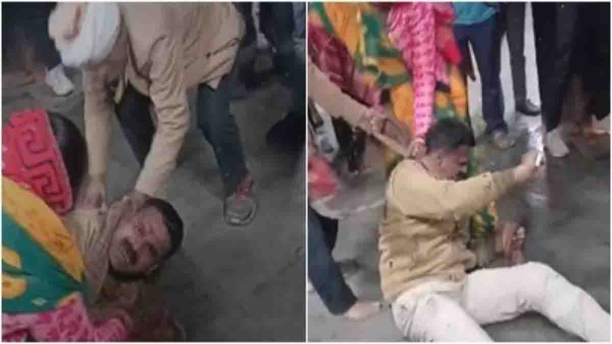 पुलिस आरक्षक को महिला-पुरुष ने पीटा, देखें वीडियो